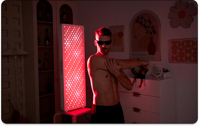 A man using red light therapy for skin rejuvenation