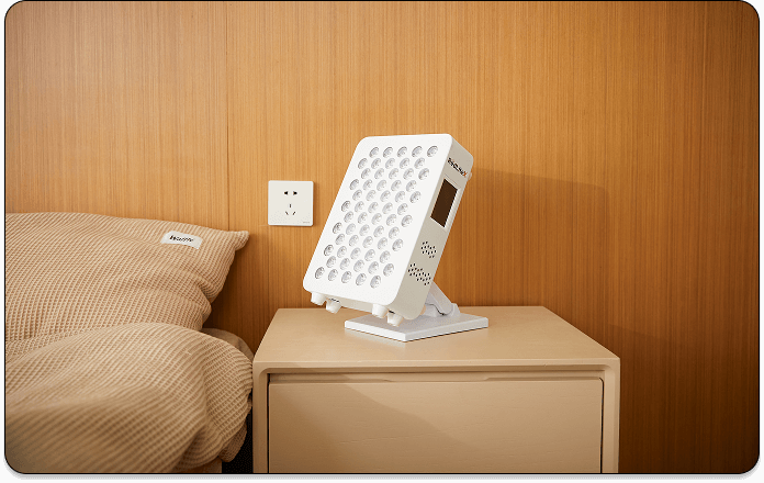 A small infrared lamp is placed on the table